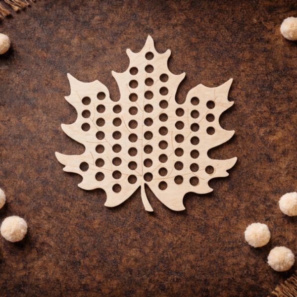 Drewniana układanka Montessori z pomponami Listek klonu